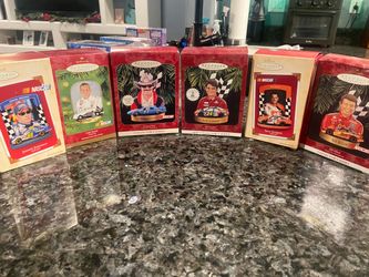 Old hallmark ornaments still in boxes.