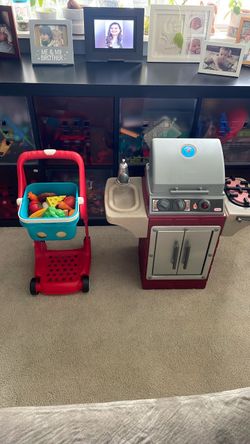 Toy BBQ and shopping cart