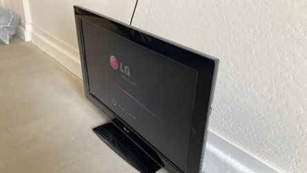 Free - LG Flat Screen 32” TV with Stand
