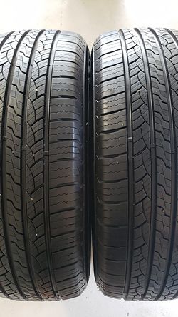 Voyager in great condition 2 tires 245 60 18 100% tread