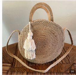 Zara Handmade Round Jute Raffia Crossbody Bag with Wooden Handles and White Tassel