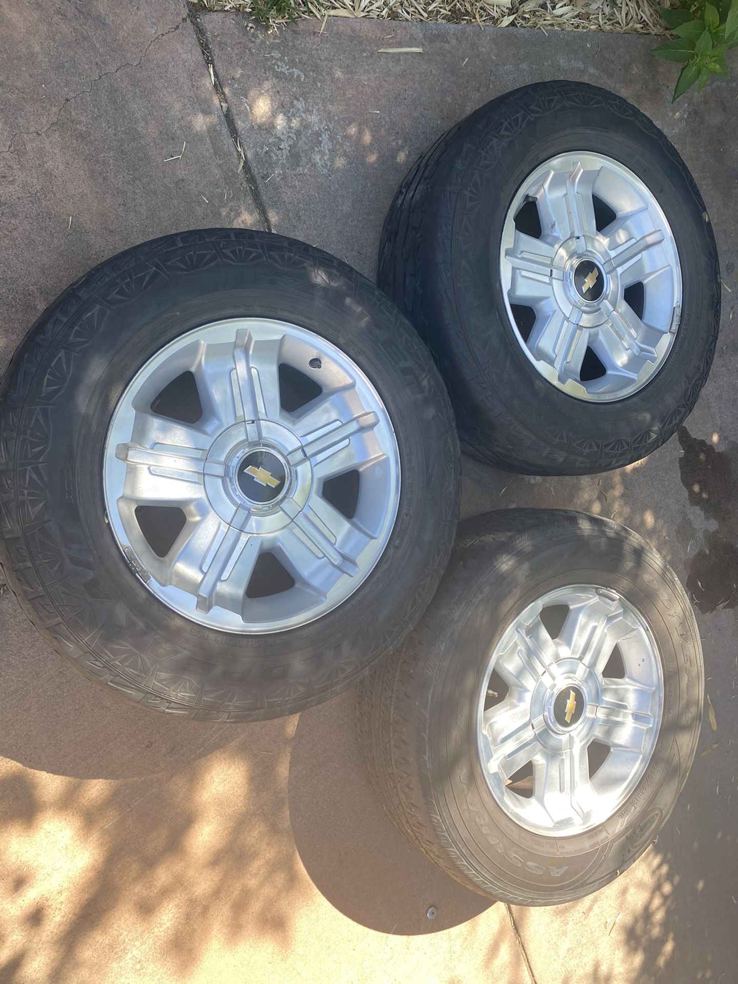 3 RIMS AND TIRES FOR A CHEVY SILVERADO