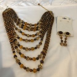 8 rows beaded hand made necklace and clips earrings.