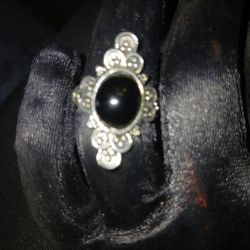 Silver ring with black onyx like stone