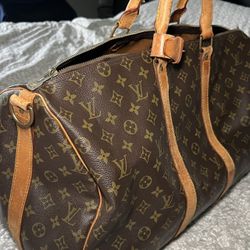 LV vintage keepall duffel bag