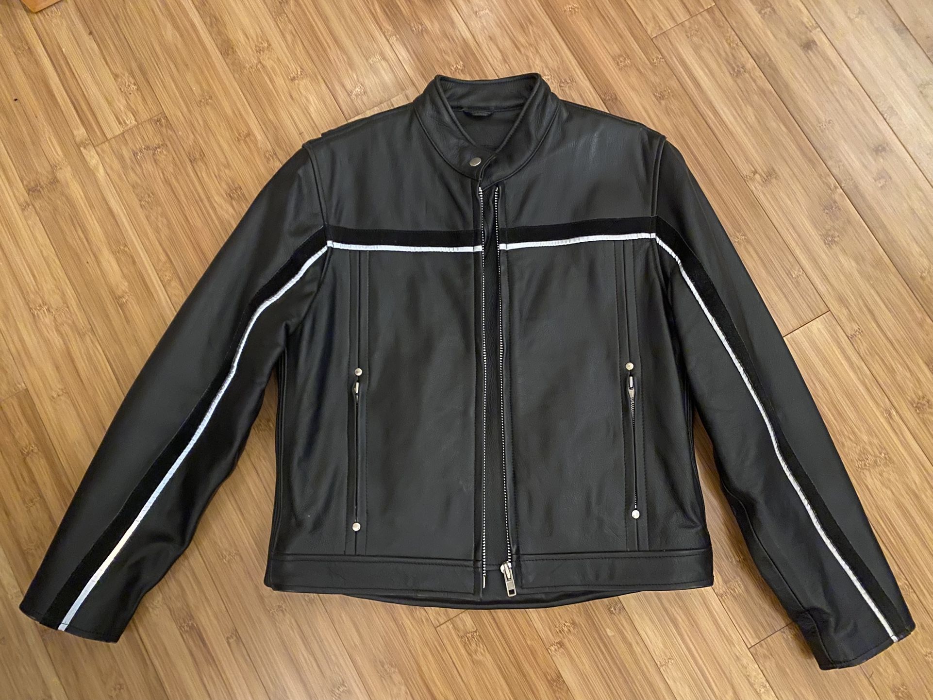 Women’s leather motorcycle jacket w/ full length removable liner.