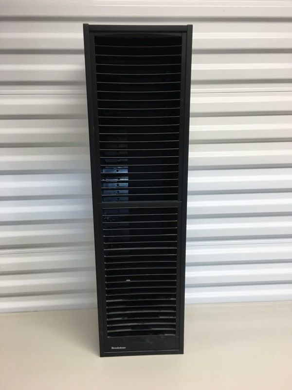 Brookstone spring loaded DVD tower