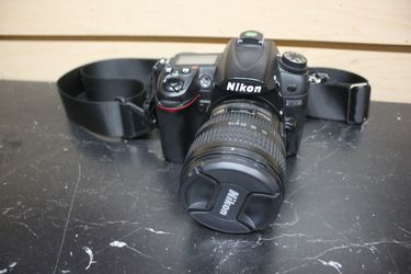 Nikon D7000 Digital SLR Camera W/Battery & 18-70mm Lens( No Charger)
