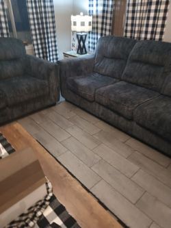 Couch and loveseat gray nothing wrong with them like new