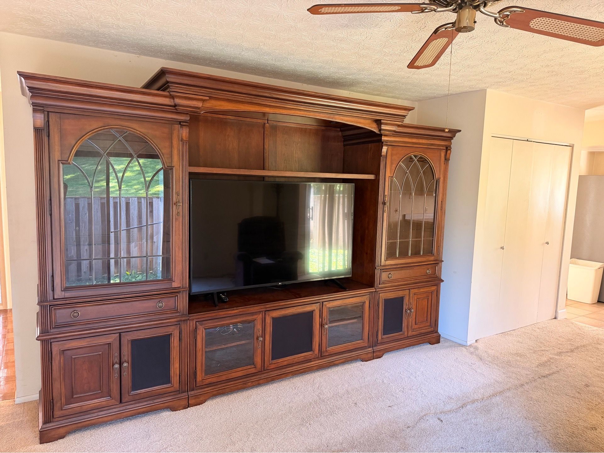 Hooker solid hardwood entertainment center with Cherry veneers