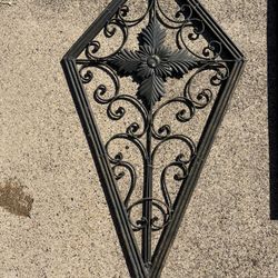 DECORATIVE WALL ART 19 3/4w x 37 3/4high; triangle; cross streets are Arapaho & Waterview 