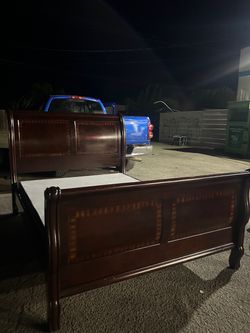 Queen bed frame with boxspring and mattress