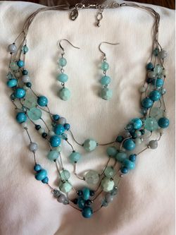Charming Claire’s necklace with dangle earrings