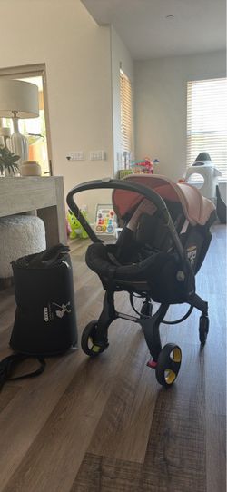 Doona Pink Travel System