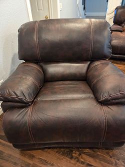 Two leather recliner rocker chairs
