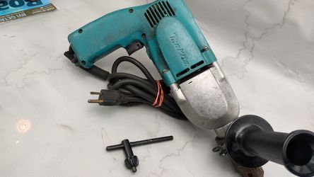Makita Super heavy duty drill /hammer drill , NEW handle an (Chuck key 35.00 value)