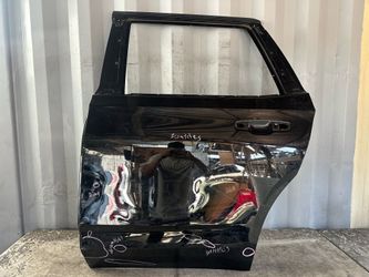2021 - 2025 GMC YUKON / CHEVY TAHOE REAR LEFT DRIVER SIDE DOOR SHELL OEM