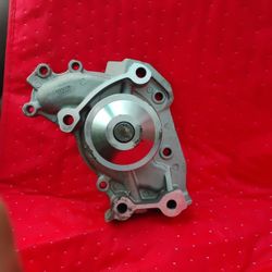 Water pump .... With Timing Belt Pulley New ! 