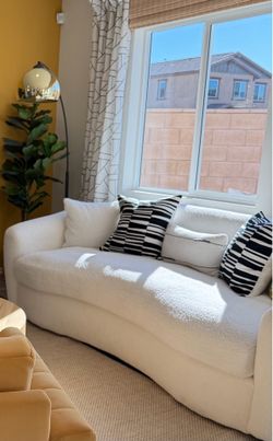 Ivory faux sheepskin sofa