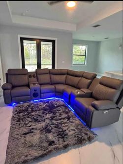 Reclining Sectional Sofa. Ask For Price 