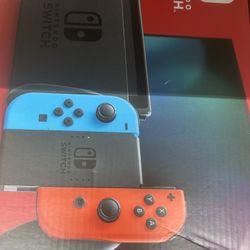 Nintendo Switch with Neon Blue and Neon Red Joy-Con