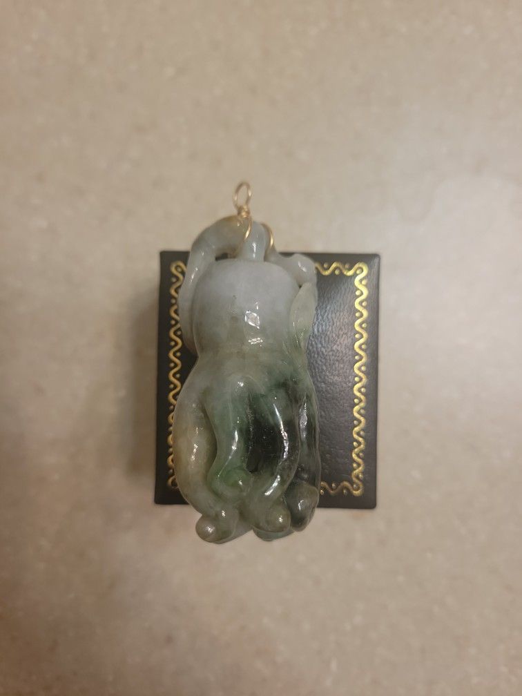 Jade Pendant With 14 K Gold Bail.  Weight Is 52.3 Grams 