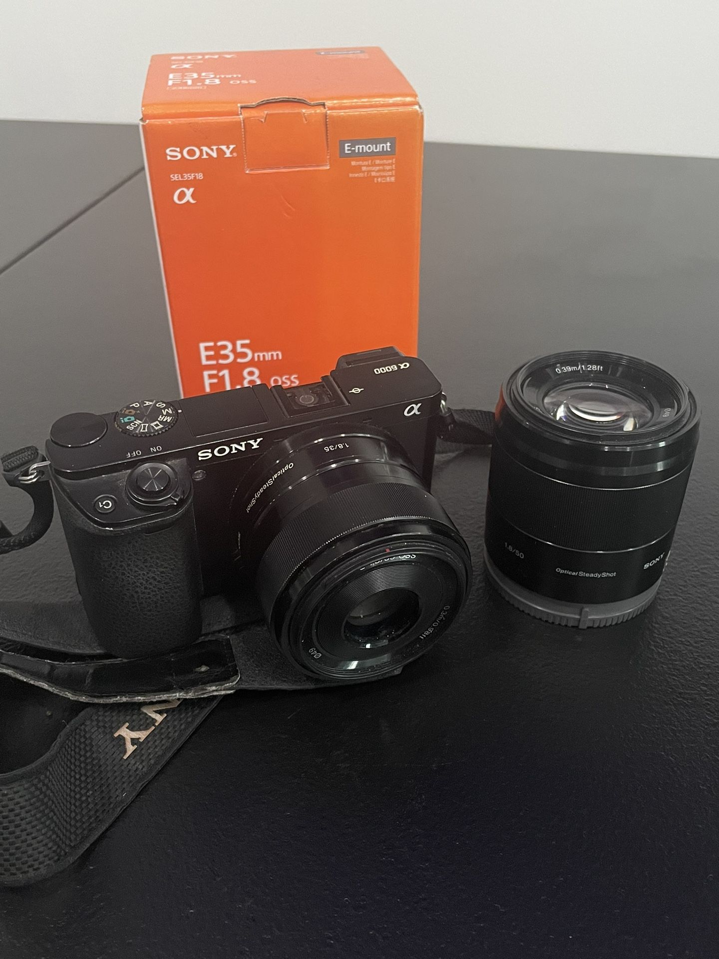 SONY A6000 W/ 2 SONY PRIME F1.8 Lenses