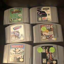 Nintendo 64 Tarzan Rugrats Wayne Gretzky 3D Hockey WWF Warzone Monopoly NASCAR  WWE N64