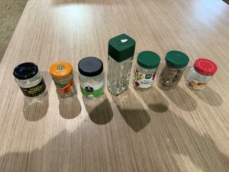 Assorted empty glass jars with lids