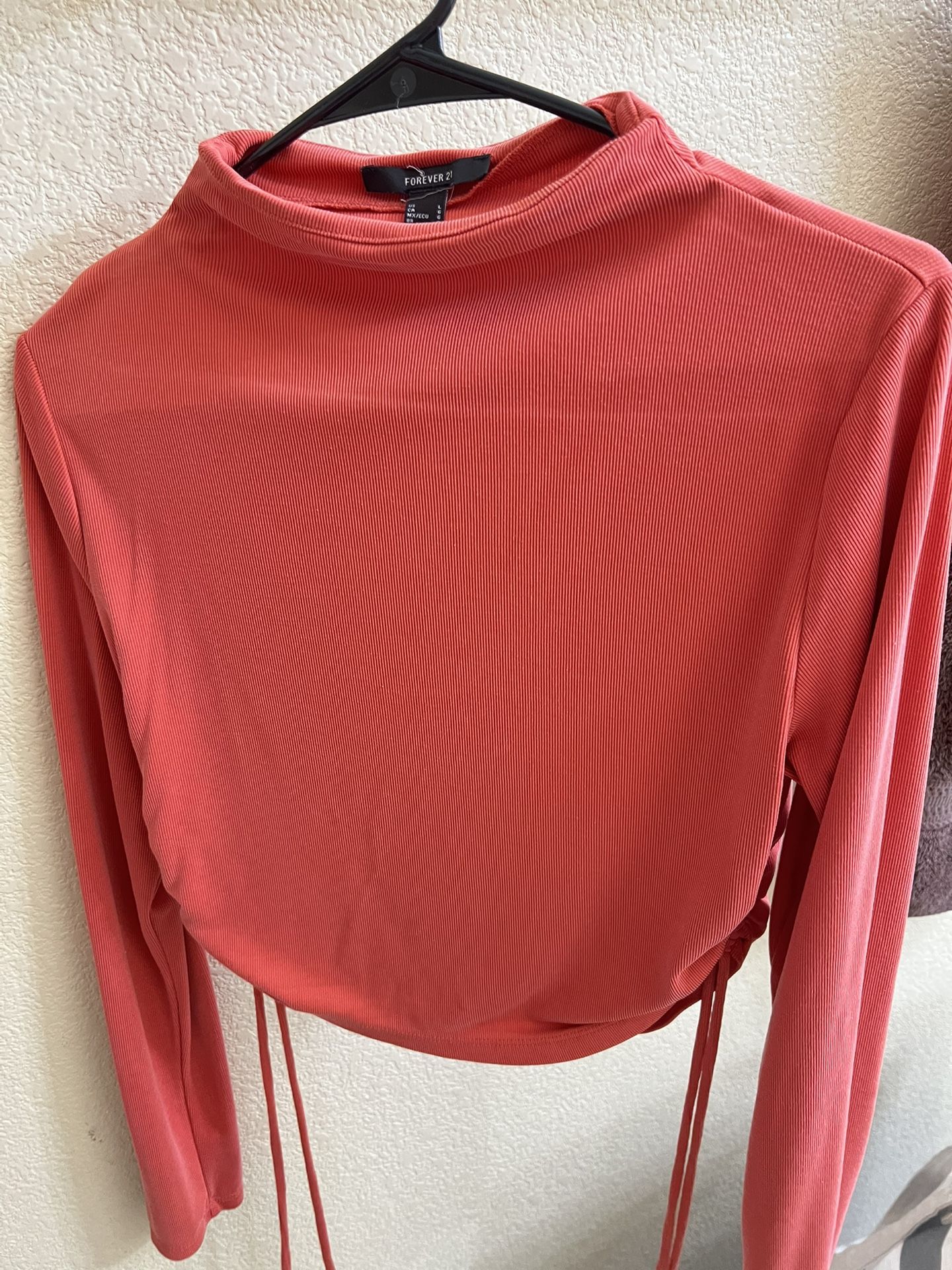 orange long-sleeved blouse