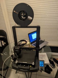 Creality 3d printer comes with an instruction manual and filament