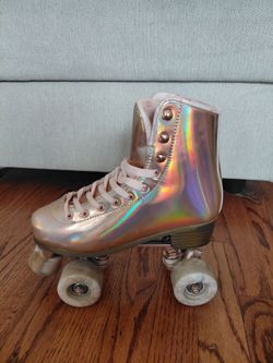 Pink Roller Skates with Protective Gear