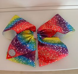 Giant Jojo Siwa rainbow bow