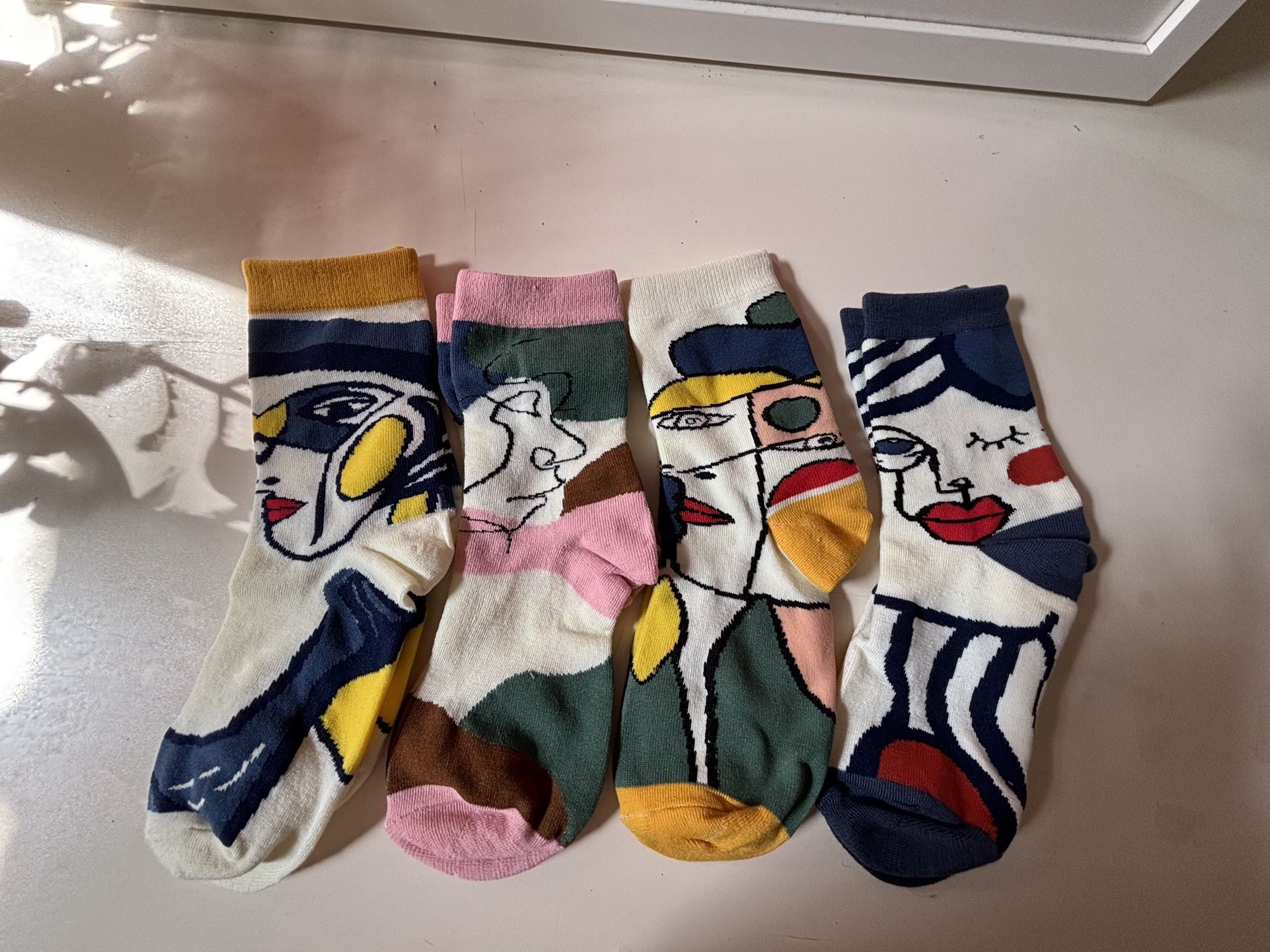 4 NEW PAIRS OF ART SOCKS NEW