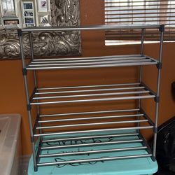 Shoe rack used like new  29 h /25 w / 11d