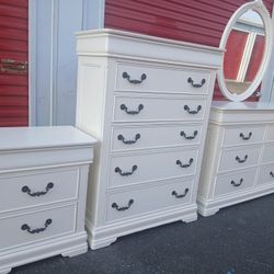 Dresser with mirror and tall dresser and nightstand 
in good condition 
