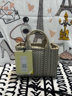 NWT the Marc Jacobs The Monogram Leather Mini Tote Bag in a khaki/beige colorway