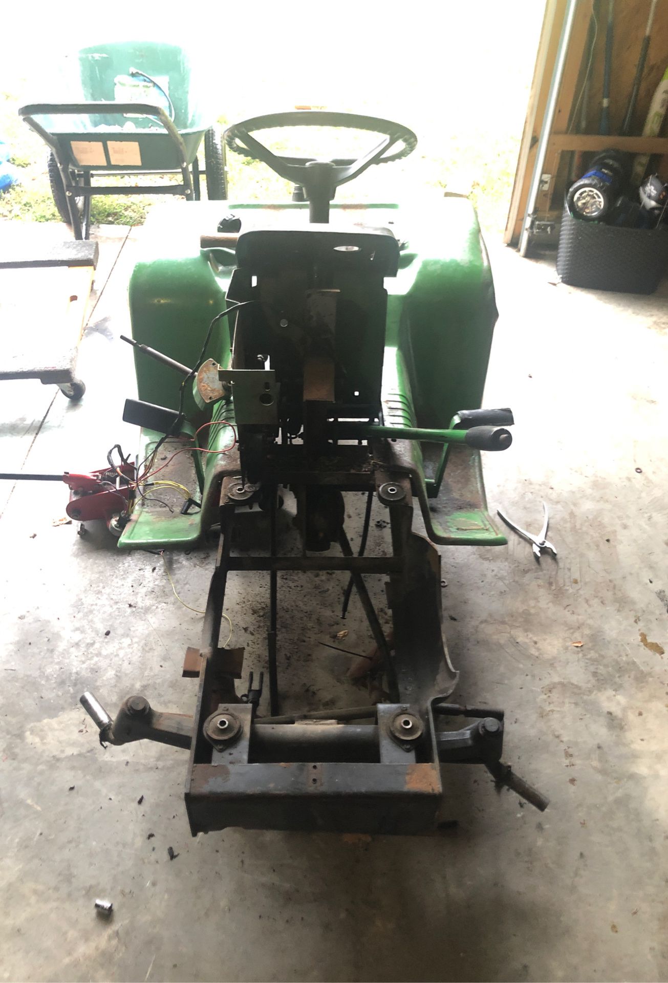 John Deere frame with steering still attached