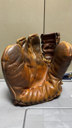 vintage 1950s Rawlings leather baseball glove, specifically a 3-finger "PML" model associated with Stan Musial.
