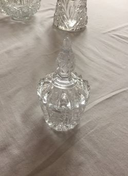 This is a glass condiment jar to dress up any table. Vintage