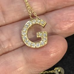 Intial “G” Pendant With Chain. Stones Are CZs. Gold Over Silver. 