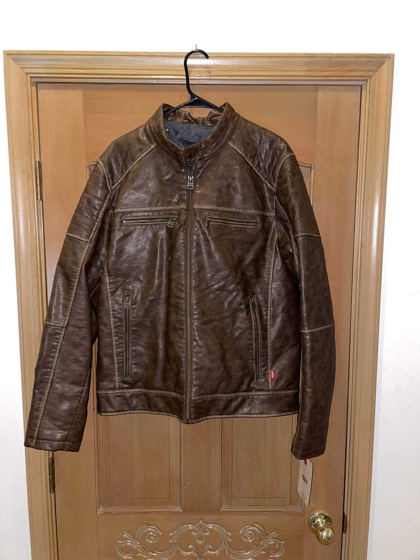 New Levi’s Brown Faux Leather Biker Jacket Medium, retails for 180.00.