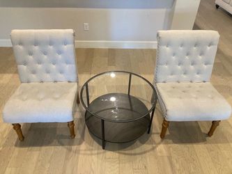 Sitting Area- 2 tufted chairs & glass table