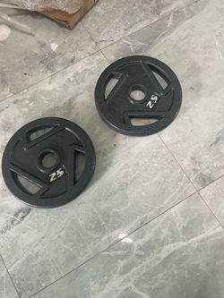 Pair of new 25lb Olympic weights plates total 50lb cash only no Zelle there easy grip check my page for items