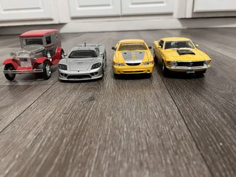 Diecast Cars 1/24 Scale Lot Of 4 Cars 20 Dollars For All Of Them