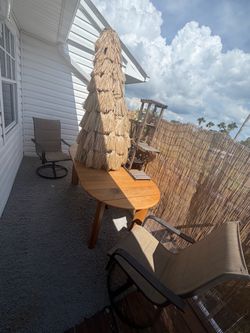 Wood table and umbrella