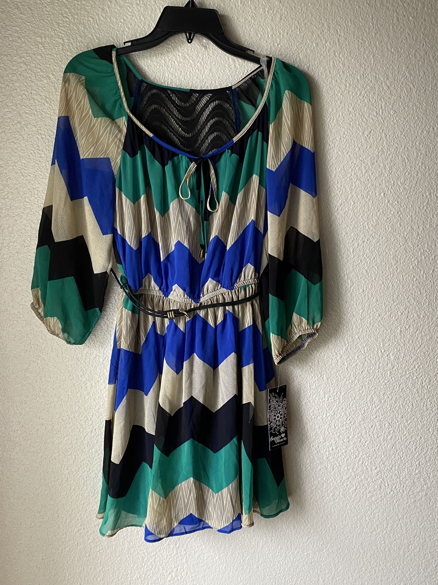 Brand new Womans Sequin Hearts brand blue, teal, black, and white colored zig zag Dress Up For Sale