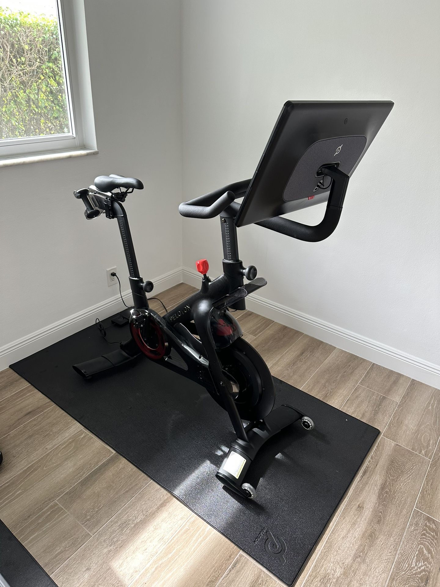Peloton Bike + Workout Mat, Weights, & Shoes