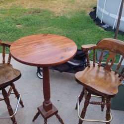 Two Swivel Wooden Bar Chairs And Bar Table