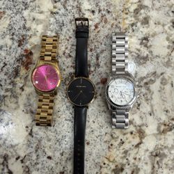 Selling a lot of (3) Michael Kors Womens Watches Stainless Steel Gold Silver Black MK-5801 MK-7100 MK-5165. They have some wear as shown in the pictur